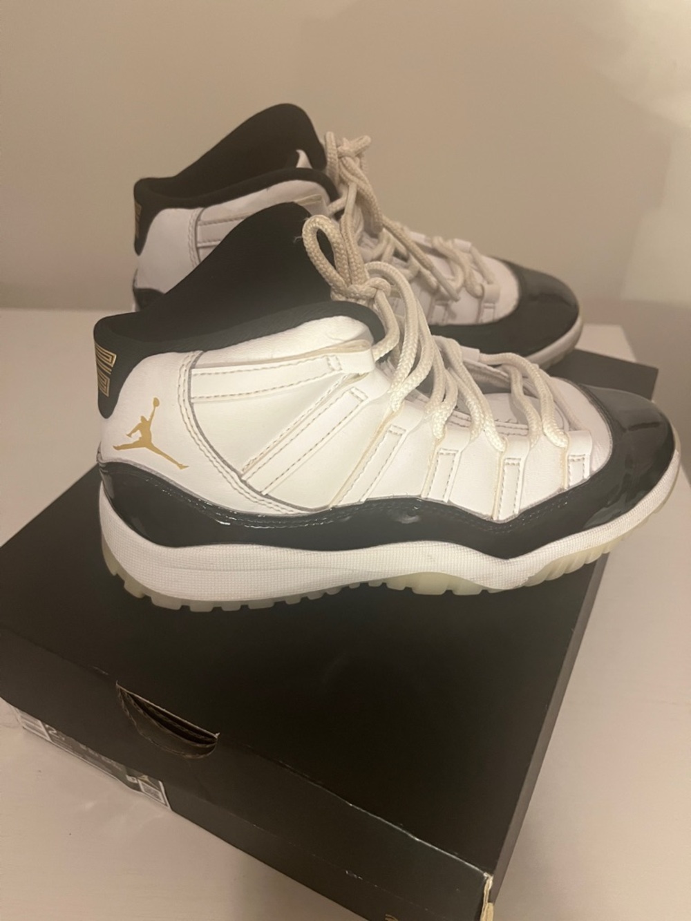 Jordan Kids White Black and Gold Retro Basketball Sneakers